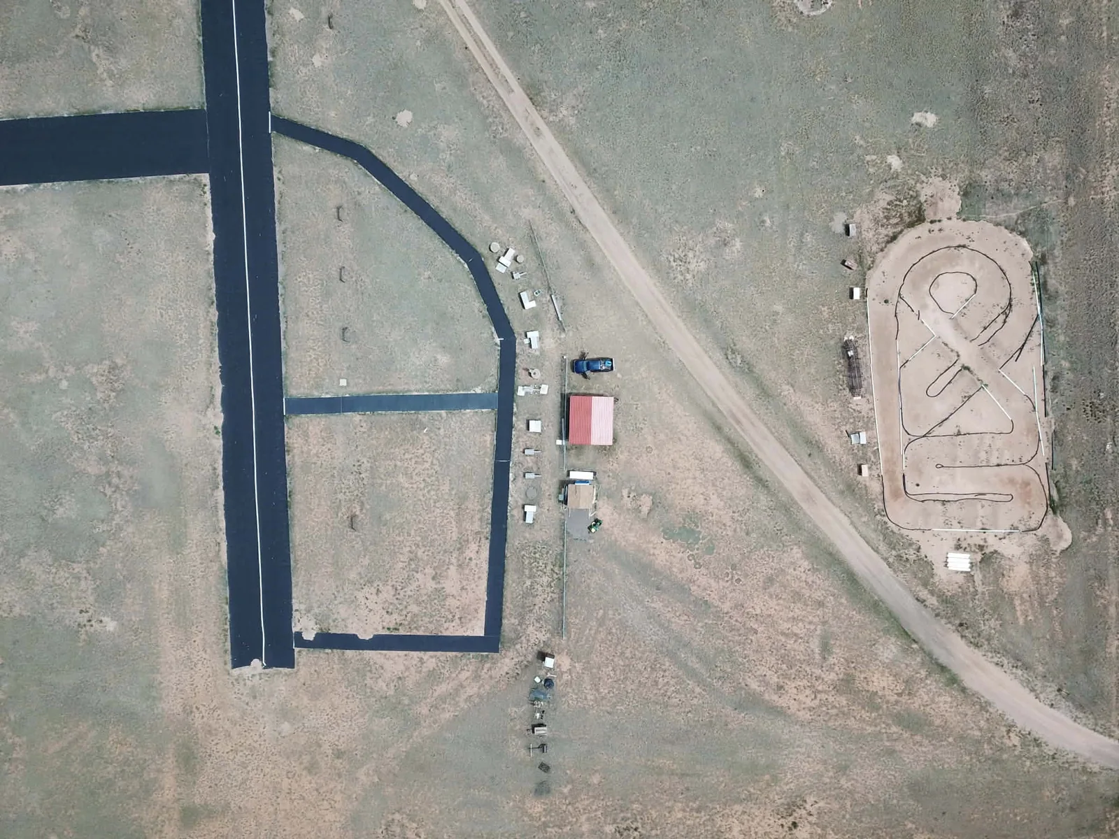 Aerial view showing the runway, club area, and RC track