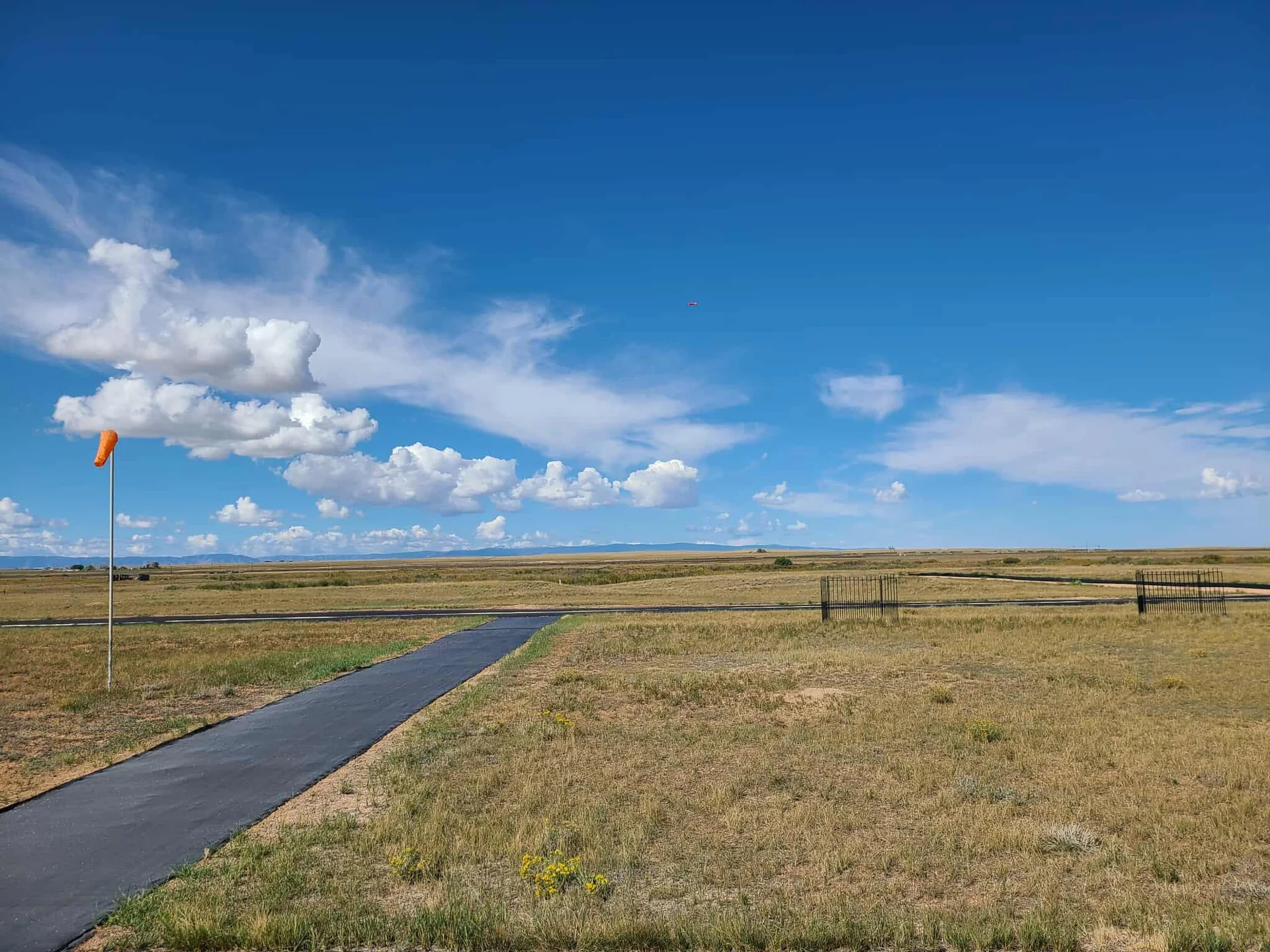 The Laramie Barnstormers airfield beneath a wide Wyoming sky